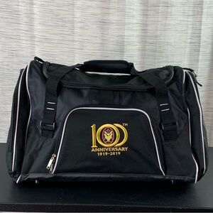 A Black 100th Anniversary Duffel Bag (Masonic?).
